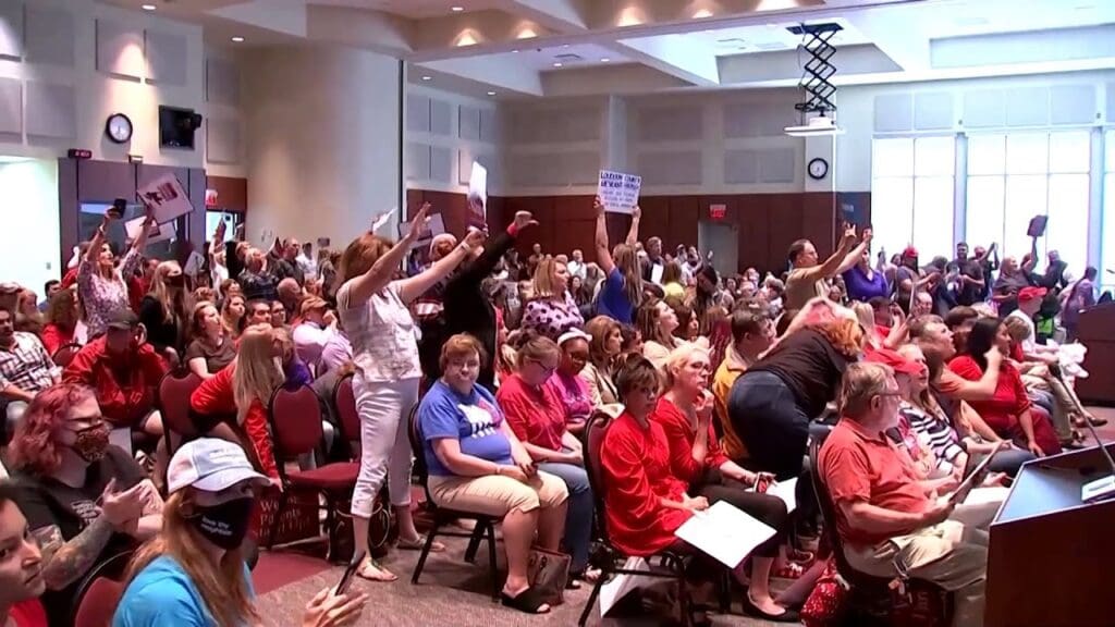 The school board of Virginia's wealthy Loudoun County had planned to hold a routine meeting to close out the school year. Instead, chaos ruled as angry parents accused the schools of teaching critical race theory, which maintains that racism is ingrained in U.S. law and institutions and has created an uneven playing field for Black Americans.